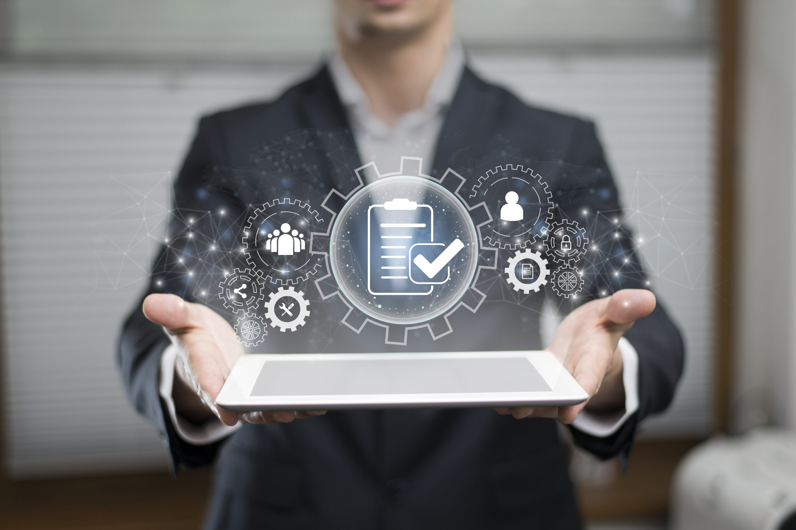 Man holding a virtual digital marketing icons